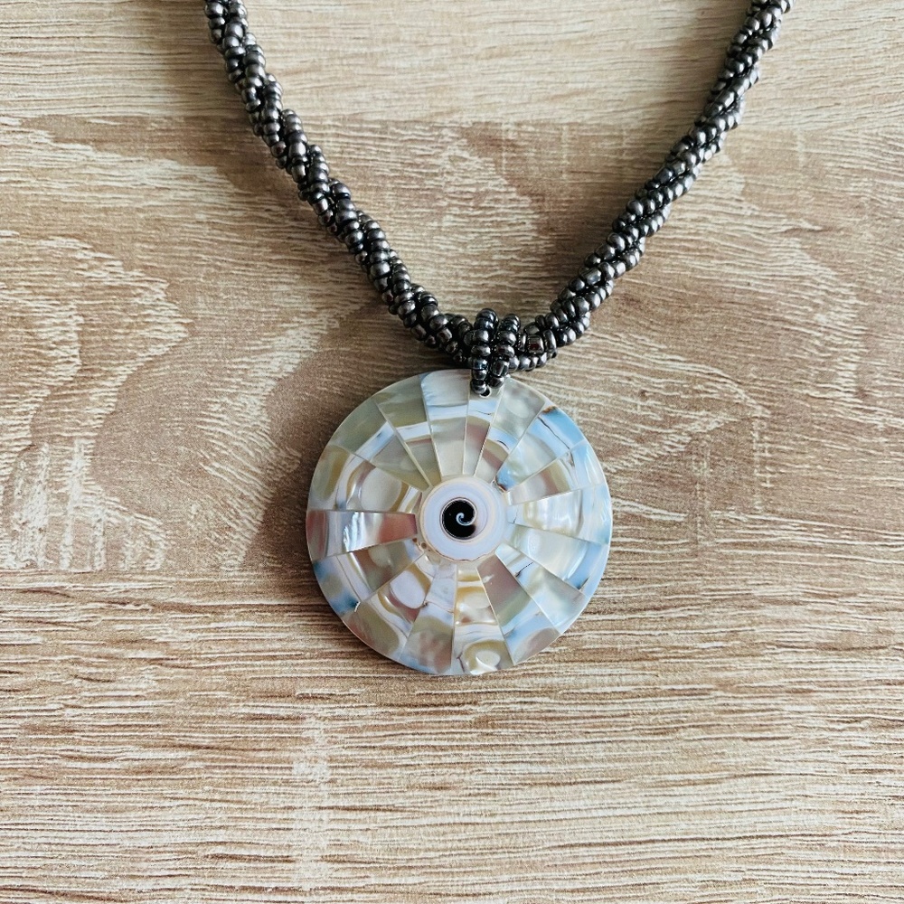 Beaded necklace with Shiva shell pendant 17”